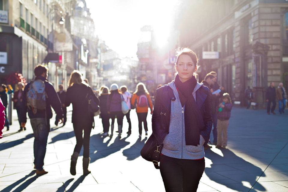 Woman and pedestrians photograph